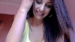 Lovely teen chick masturbates in front of the camera