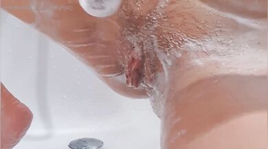 Showing off her tight little pussy to friends gets messy in the shower