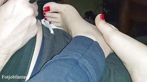 Authentic babe massages cock while he plays PlayStation