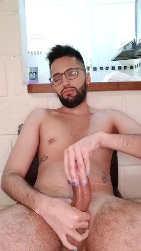 Jerking my big uncut cock with lube until I cum