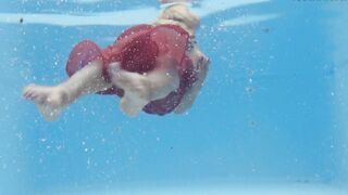 Hottest mom gets naked underwater