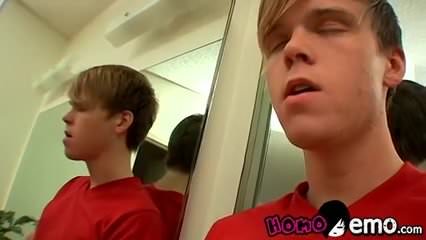 Horny blond twink Colby Bonds jerking his big cock for jizz