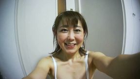 Asian Woman Stretching in Sexy Costume