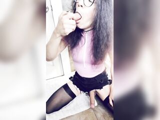 Cute sissy doxy teases and sucks sextoy
