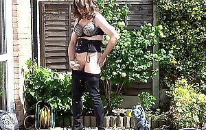 Thigh-booted Crossdresser Strokes Outdoors