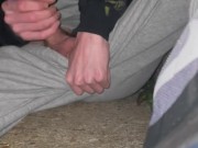 Scally lad gets horny smoking and strokes his dick outside