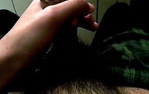 Asian boy playing with his camera-shy cock