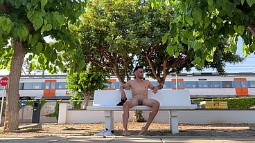 Fully naked on a park bench while train is passing by