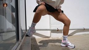 College Girl In A Miniskirt Pees