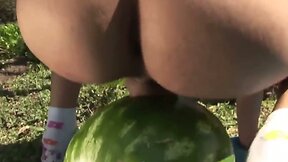 Shemale fucks a watermelon