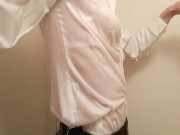 Taking a shower while crossdressing. (pink bra is seen through the blouse)