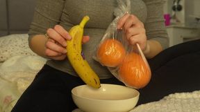 I'll peel the banana and orange and eat them because they're delicious.