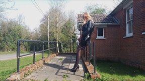 Gina in pvc performing at village hall