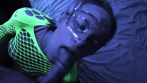 Petite white girl gets a huge facial under neon lights