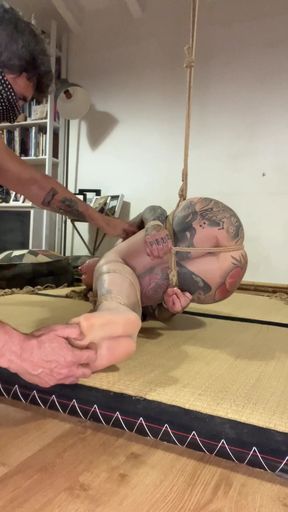Tickle session bound in nylon and ropes