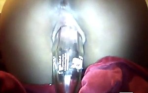 Bottle in the pussy