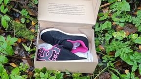 Pink DC sneakers muddy