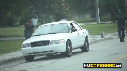 Milf cops pull out suspects hard cock and make him drill their coochies