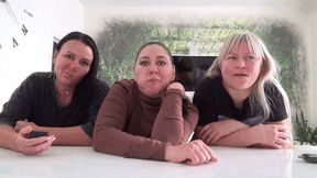 THREE GIRLS LOOKING AT THE CAMERA L