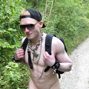 Slave in Chastity on a naked summer hike