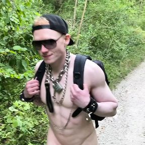 Slave in Chastity on a naked summer hike