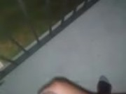Playing with my cock on the balcony