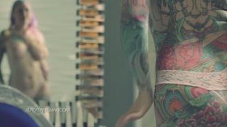Tattooed Beauty Strips Naked