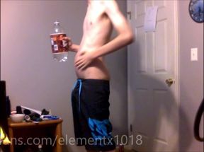 Young Guy Fills His Stomach with Water