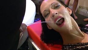 European babe enjoys getting pissed on at bukkake