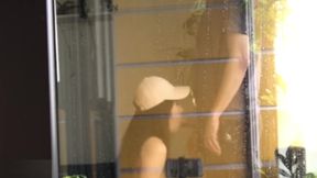 Hot neighbor girl gives blowjob in front of window