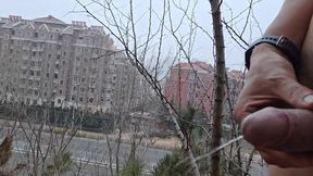 A naked man masturbated in a place.