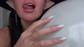 The shrill sound of a witch scratching a balloon dd