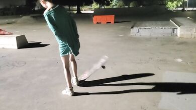 Her small tits bounce as she loses control skateboarding naked in public