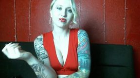 Tattooed Blonde in Red Dress Talks to Customer