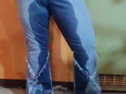 Desperate chubby MILF pees in blue jeans