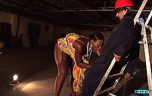Superb thick ebony is fucking a guy in interracial at his car repair shop