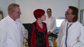 Sexy redhead gets fucked in threesome in the doctors office