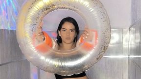 Two pairs of water wings and a water ring in the jacuzzi