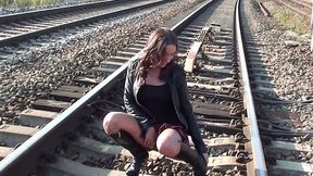 Dirty amateur chick strips and masturbates slit on the rail way