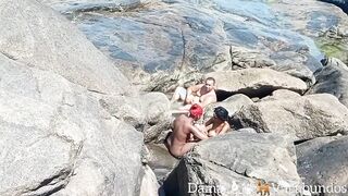 Naturists caught on the beach at an outside group sex -