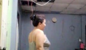 Mature thai lady stripping