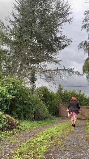 In an outfit with a very short black dress for an evening out.