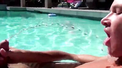 Damon Archer grabs his dick and masturbates by the pool