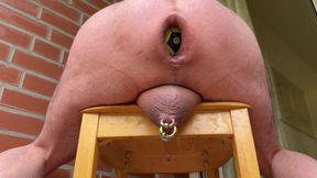 Balls in the ass on the balcony