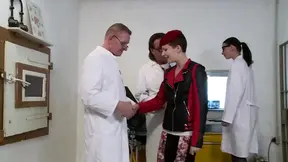 Hot redhead gets fucked in office threesome with a doctor