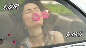 Messy Pink lipgloss marks on the Car Window