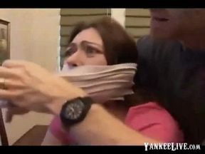 Bound and gagged girl gets banged on the table