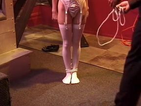 Hottie with a decent rack getting ready for a BDSM session