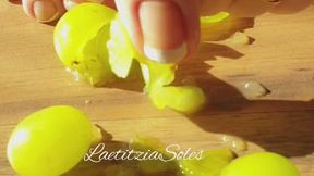 naked divine feets and fruit crushing