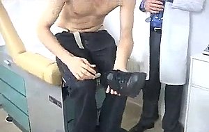 Doctor gives patient a anal exam with his tongue